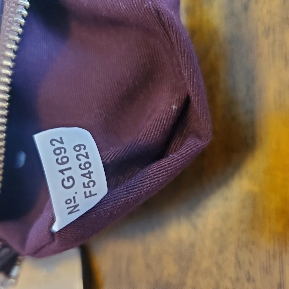 Coach Signature Monogram Leather Strap Wristlet